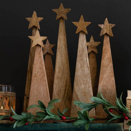 Seven Wooden Christmas Trees On Base